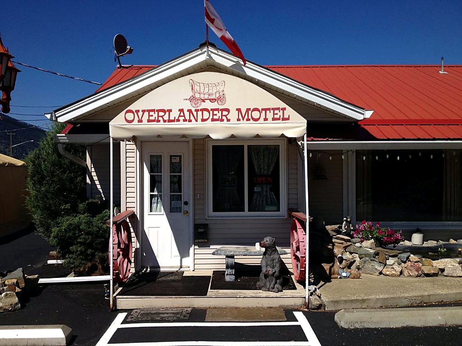 The original Overlander Motel entrance with its wagon sign