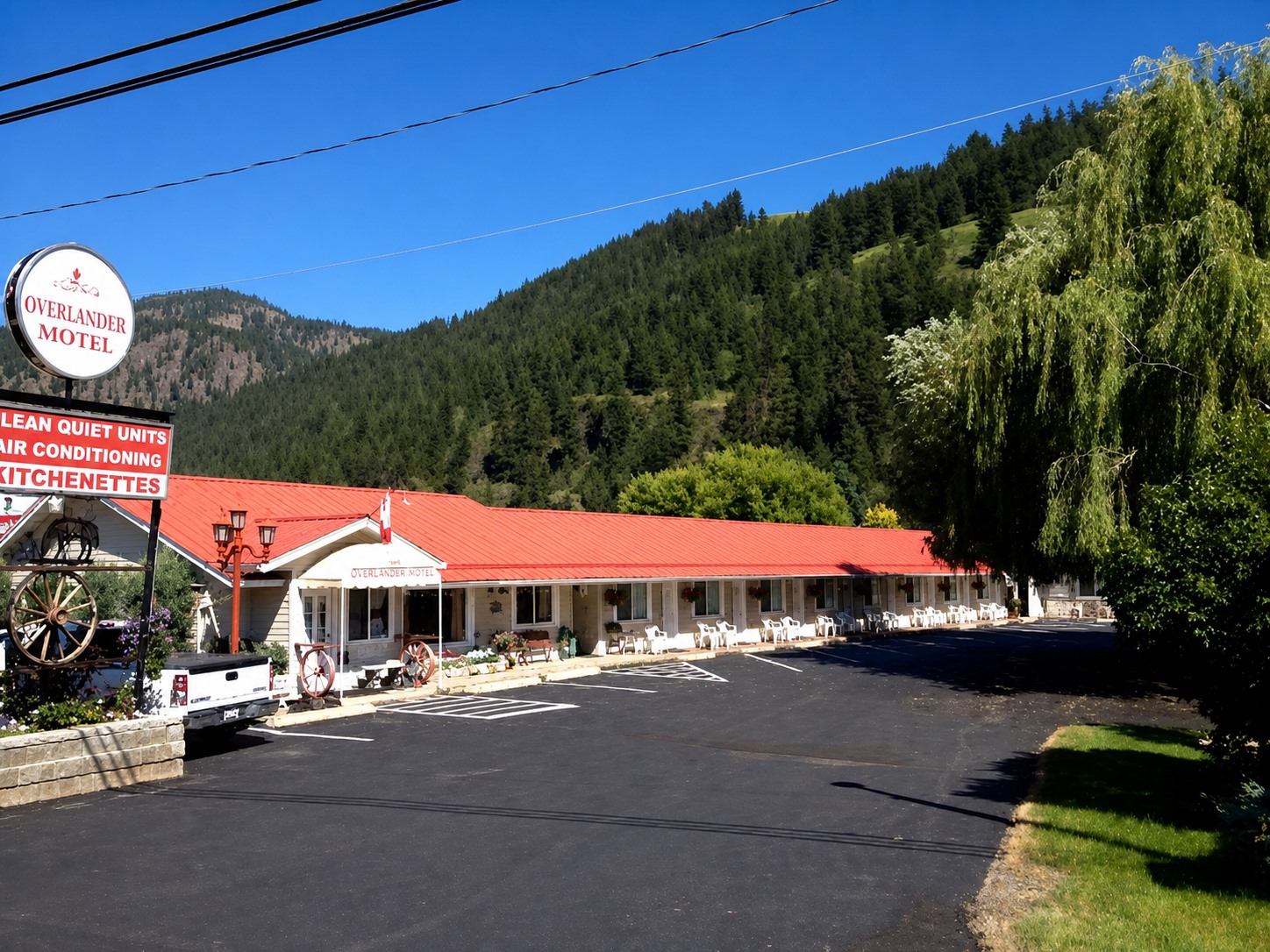 Overlander Motel beside the forested mountains in Chase, BC